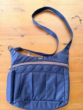 Lug Navy Quilted Swing Crossbody Bag
Purse Bag Pockets & water bottle holder